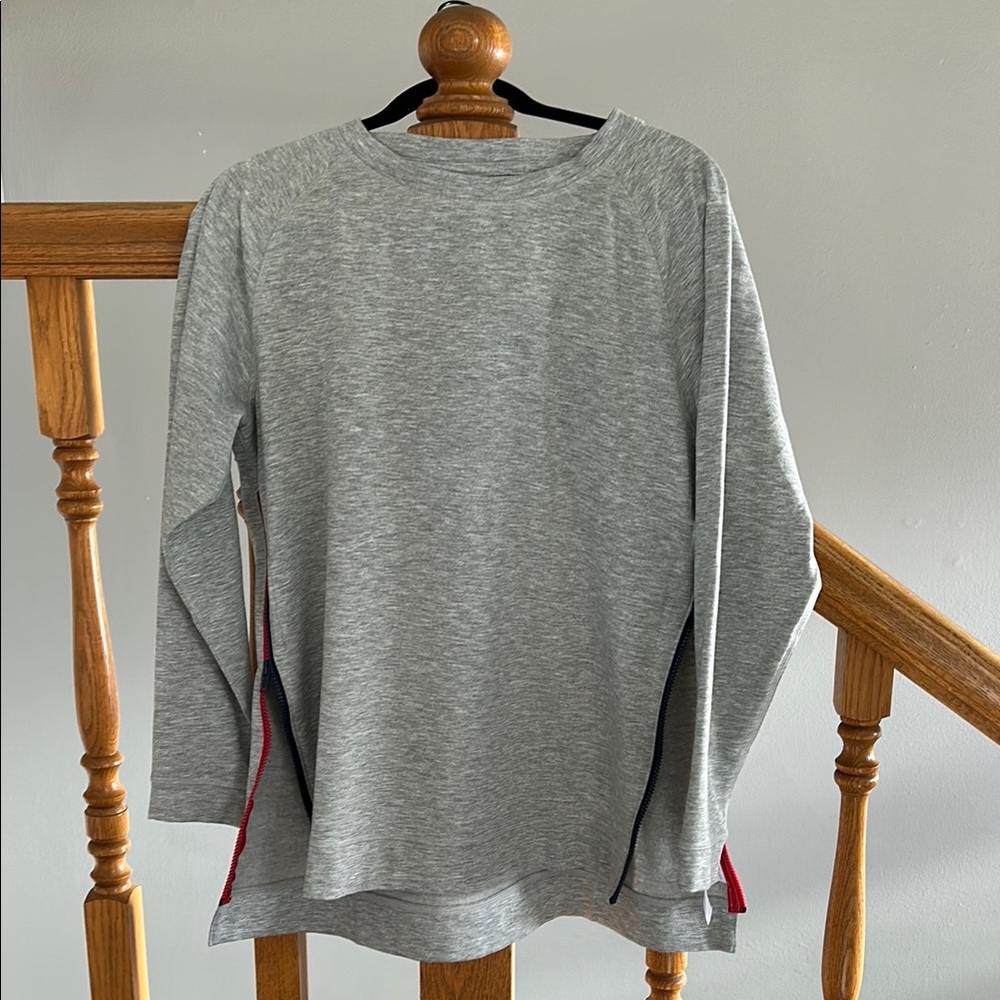 Gray Long Sleeve Top with Red and Blue Zipper Accents